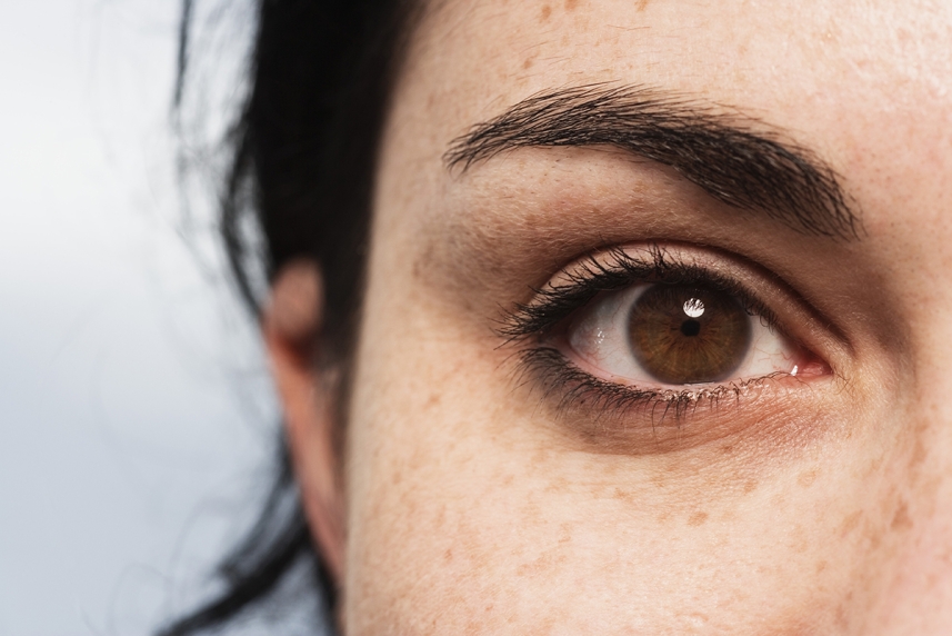 Close-up of woman's brown eye