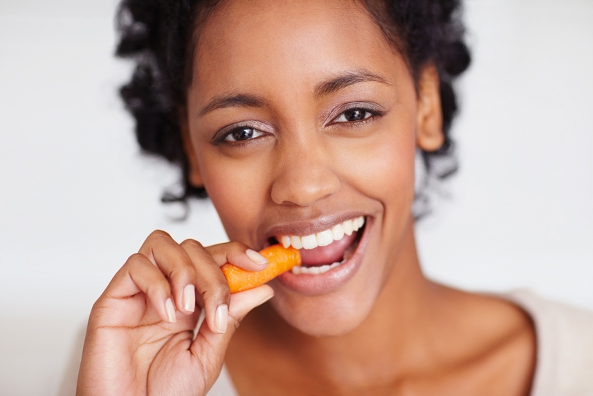 Person eating a carrot