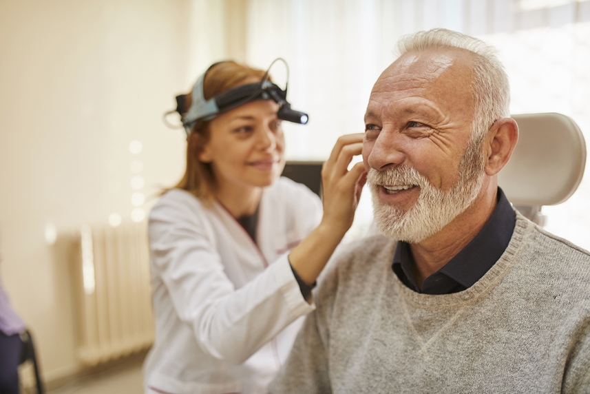 Older man getting a hearing test