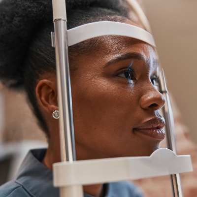 Patient getting her eyes checked