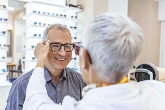 Person trying on glasses