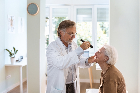 Older woman getting an eye exam