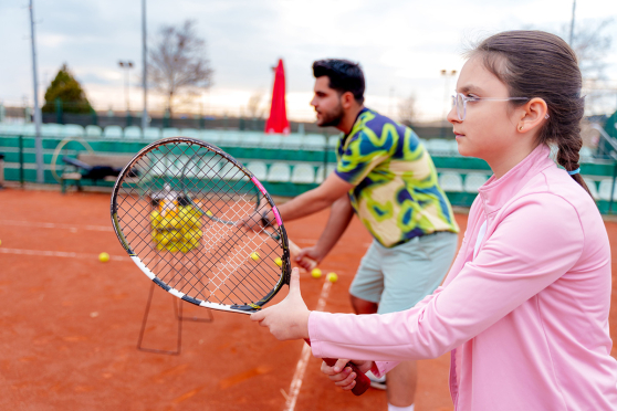 Kid playing tennis