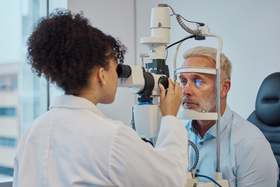 Senior man getting an eye exam