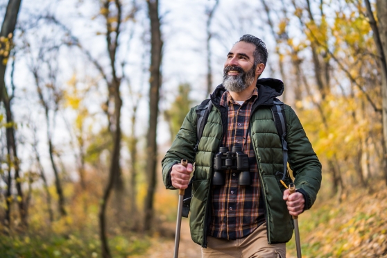 An adult man whose had LASIK surgery traveling
