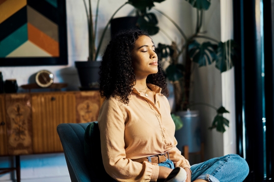 An adult woman doing an eye exercise for better focus and clarity 