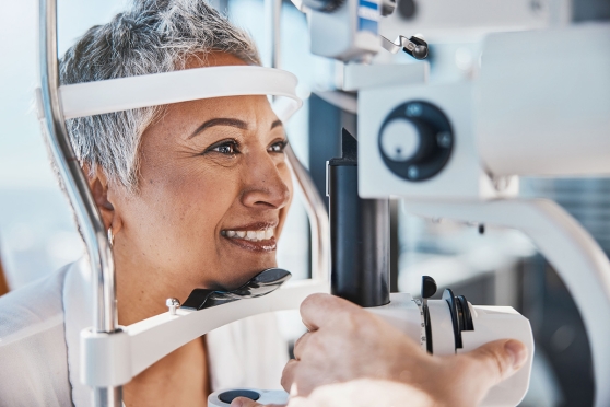 An older woman with diabetes learning how Medicare may cover her eye care