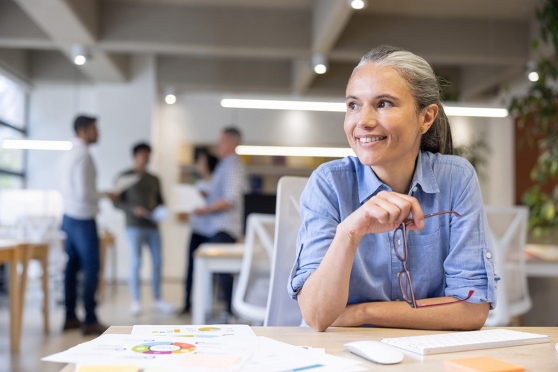 An adult woman thinking about how regular eye exams supercharge her workday 