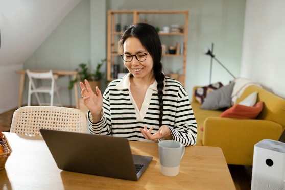 Woman on a laptop wearing glasses